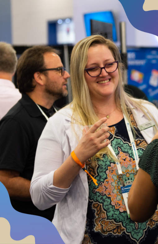 Woman smiling whilst on the show floor