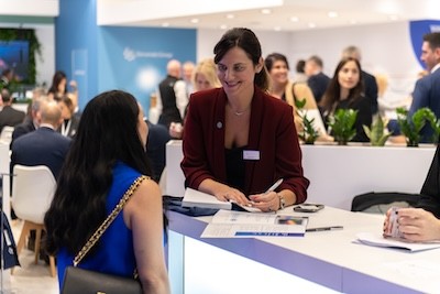 Pharma professionals talking at CPHI event