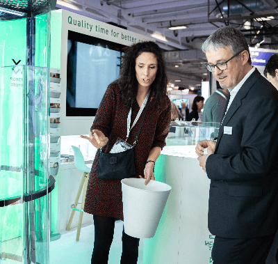 Female professional giving pharma product demonstration 